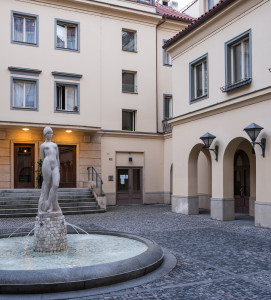 Courtyard and entrance to the cinema behind the statue | Photo: Czech Film Commission